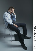 Elegant miserable guy got fired. Стоковое фото, агентство Ingram Publishing / Фотобанк Лори