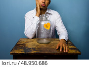 Upset man has spent all his money. Стоковое фото, агентство Ingram Publishing / Фотобанк Лори