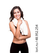 Fitness woman wiping sweat with a towel. Стоковое фото, агентство Ingram Publishing / Фотобанк Лори