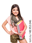 Beautiful little girl holding sketchbooks over white. Стоковое фото, агентство Ingram Publishing / Фотобанк Лори