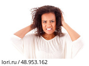 Frustrated and angry african woman over white background. Стоковое фото, агентство Ingram Publishing / Фотобанк Лори