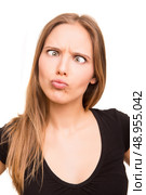 Blonde girl doing crazy and silly faces. Стоковое фото, агентство Ingram Publishing / Фотобанк Лори
