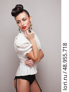 Beautiful model with updo and a stocking. Стоковое фото, агентство Ingram Publishing / Фотобанк Лори