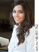 Pretty young business woman wearing formal clothes. Стоковое фото, агентство Ingram Publishing / Фотобанк Лори