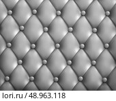Grey button-tufted leather background. Vector illustration. Стоковая иллюстрация, агентство Ingram Publishing / Фотобанк Лори