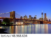 Brooklyn Bridge sunset New York Manhattan skyline NY NYC USA. Стоковое фото, агентство Ingram Publishing / Фотобанк Лори