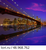 Brooklyn Bridge sunset New York Manhattan skyline NY NYC USA. Стоковое фото, агентство Ingram Publishing / Фотобанк Лори