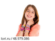 Loom rubber bands bracelets blond kid girl smiling hands in neck on white background. Стоковое фото, агентство Ingram Publishing / Фотобанк Лори