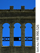 old window and wall in plaza de toros centre of colonia del sacramento uruguay. Стоковое фото, агентство Ingram Publishing / Фотобанк Лори