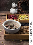 wooden box with herbs traditional medicine from home kit in the rural style.Selective focus. medicinal herb. Стоковое фото, агентство Ingram Publishing / Фотобанк Лори