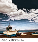Almeria Cabo de Gata San Miguel beach boats in Spain. Стоковое фото, агентство Ingram Publishing / Фотобанк Лори