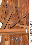 Ipe decking deck wood installation screws clips and fasteners. Стоковое фото, агентство Ingram Publishing / Фотобанк Лори