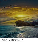 Almeria Playa del Monsul beach sunset at Cabo de Gata in Spain. Стоковое фото, агентство Ingram Publishing / Фотобанк Лори