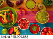 Mexican food mixed guacamole nachos chili sauce dipping cheddar cheese lemon pico de gallo. Стоковое фото, агентство Ingram Publishing / Фотобанк Лори
