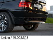 KRASNOYARSK, RUSSIA - May 23, 2025: Black BMW X5 E53. Редакционное фото, фотограф Плотников Дмитрий / Фотобанк Лори