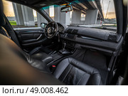 KRASNOYARSK, RUSSIA - May 23, 2025: Black BMW X5 E53. Редакционное фото, фотограф Плотников Дмитрий / Фотобанк Лори