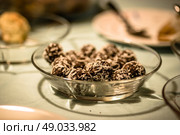 Coconut and chocolate confectionery served at christmas time. Стоковое фото, агентство Ingram Publishing / Фотобанк Лори