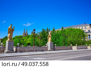 Burgos San Pablo bridge Statues and Cathedral over Arlanzon river in Castilla Spain. Стоковое фото, агентство Ingram Publishing / Фотобанк Лори