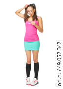 Schoolgirl with positive pregnancy test isolated. Стоковое фото, агентство Ingram Publishing / Фотобанк Лори