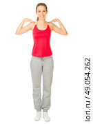 Young sporty girl doing gymnastic exercises isolated. Стоковое фото, агентство Ingram Publishing / Фотобанк Лори