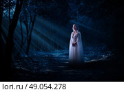 Young elven girl in night forest. Стоковое фото, агентство Ingram Publishing / Фотобанк Лори