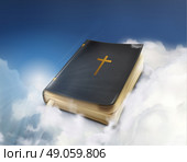 Bible, old book in the clouds vector illustration. Стоковая иллюстрация, агентство Ingram Publishing / Фотобанк Лори