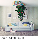 room with a Christmas tree on the ceiling and surprised baby. photo-combinated concept. Стоковое фото, агентство Ingram Publishing / Фотобанк Лори