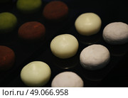 Colorful Japanese dessert mochi. Стоковое фото, агентство Ingram Publishing / Фотобанк Лори