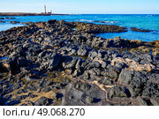 El Cotillo beach and Toston lighthouse at Fuerteventura Canary Islands. Стоковое фото, агентство Ingram Publishing / Фотобанк Лори