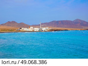 Punta Jandia Fuerteventura and Puerto de la Cruz village at Canary Islands. Стоковое фото, агентство Ingram Publishing / Фотобанк Лори