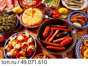 Tapas from spain varied mix of most popular tapa mediterranean food. Стоковое фото, агентство Ingram Publishing / Фотобанк Лори