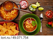 Pozole with mote big corn stew from Mexico with ingredients and appetizer. Стоковое фото, агентство Ingram Publishing / Фотобанк Лори