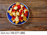 Tapas Patatas Bravas potatoe fries with tomato and mayonaise from Spain. Стоковое фото, агентство Ingram Publishing / Фотобанк Лори
