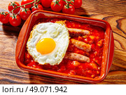 Tapas pisto con tomate ratatouille egg and sausage from Spain. Стоковое фото, агентство Ingram Publishing / Фотобанк Лори