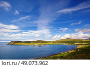view on Uig harbour and village, Isle of Skye, Trotternish peninsula, Scotland. Стоковое фото, агентство Ingram Publishing / Фотобанк Лори
