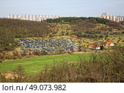 temporary car parking on the field. Стоковое фото, агентство Ingram Publishing / Фотобанк Лори