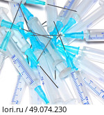 heap of used disposable syringes. Стоковое фото, агентство Ingram Publishing / Фотобанк Лори