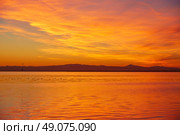 La Albufera lake sunset in El Saler of Valencia at Spain. Стоковое фото, агентство Ingram Publishing / Фотобанк Лори