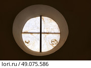 alabaster round window with cross difussed light for churches in Spain. Стоковое фото, агентство Ingram Publishing / Фотобанк Лори