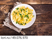 plate of ravioli on old wooden table. Стоковое фото, агентство Ingram Publishing / Фотобанк Лори