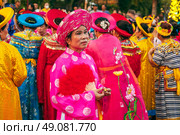 Vietnamese women in colorful Cham costumes near Po Nagar Towers in Nha Trang at a celebration. NHA Trang, Vietnam - April 17th, 2025. Редакционное фото, фотограф Корчагина Анастасия / Фотобанк Лори