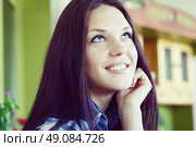 portrait of a young brunette woman with long beautiful hair close-up. Стоковое фото, агентство Ingram Publishing / Фотобанк Лори