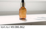 Natural oil cosmetics. Dropper glass amber Bottle Mock-Up. Oily cosmetic pipette. Face and body treatment. Spa concept. Mineral organic liquid. Front view. Beauty products. Blank packaging on white. Стоковое видео, видеограф Марина Демидюк / Фотобанк Лори