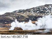 Steam cabin with geothermal activity at the strokkur geyser in Iceland. Стоковое фото, агентство Ingram Publishing / Фотобанк Лори