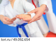 Child in a martial arts lesson. Стоковое фото, агентство Ingram Publishing / Фотобанк Лори