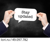Stay updated written on a speechbubble. Стоковое фото, агентство Ingram Publishing / Фотобанк Лори