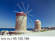 Rhodes windmills, Mandrake Harbour windmills on the Island of Rhodes. Стоковое фото, агентство Ingram Publishing / Фотобанк Лори