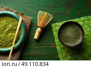 Matcha tea powder bamboo whisk chasen and spoon for japanese ceremony. Стоковое фото, агентство Ingram Publishing / Фотобанк Лори