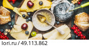 Various Cheese plate with honey dip ,berries and  buns, top view, banner. Стоковое фото, агентство Ingram Publishing / Фотобанк Лори