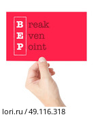 Break Even Point explained on a card held by a hand. Стоковое фото, агентство Ingram Publishing / Фотобанк Лори